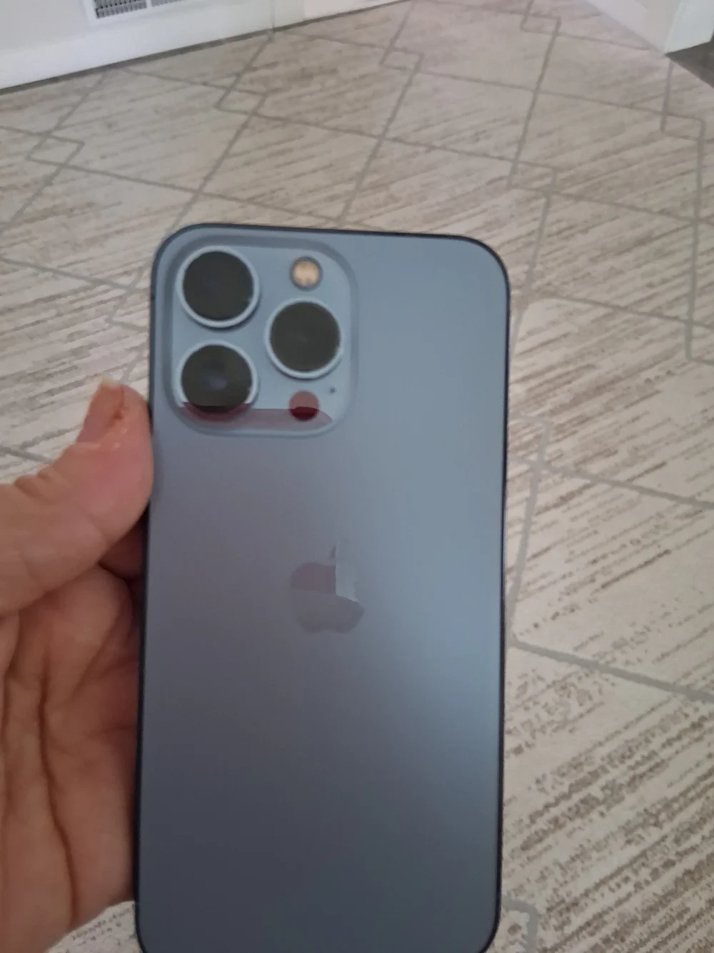 Apple Black Smartphone with Blue-Green Display